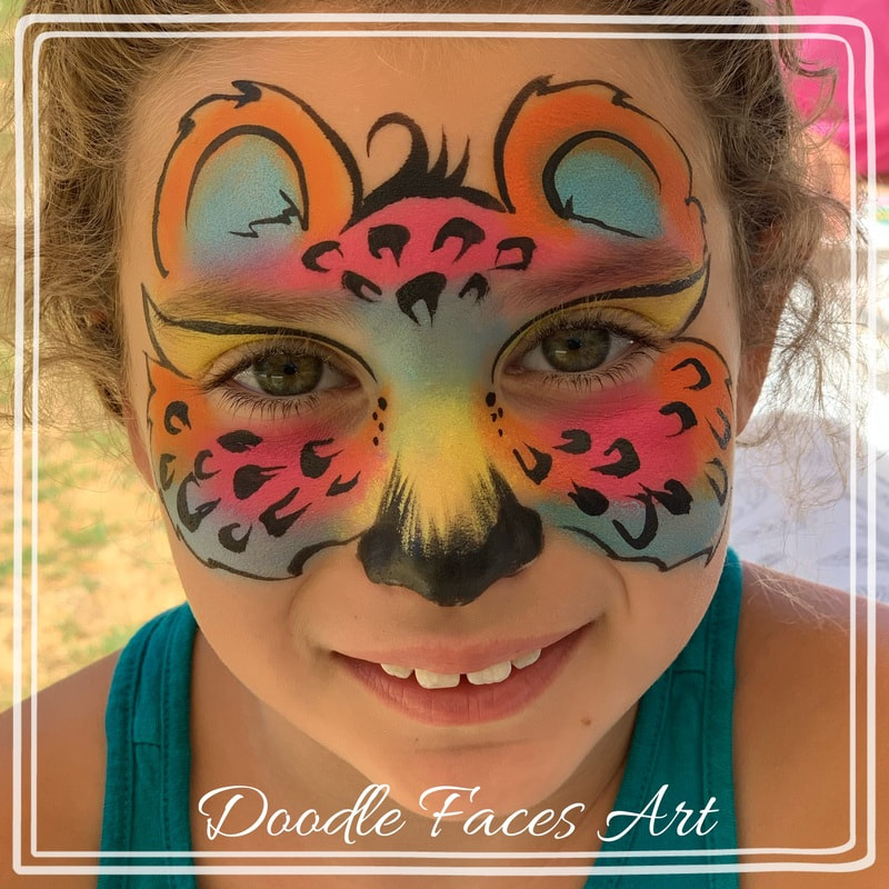 The rainbow cheetah has - Daizy Design Face Painting